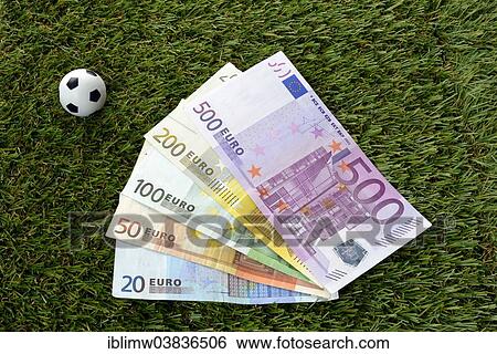 Stock Photograph - "Euro notes, soccer balls". Fotosearch