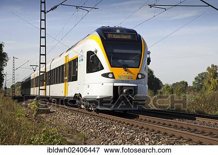 Stock Photo - "Eurobahn regional train, Kamen, Ruhr area, North Rhine-Westphalia, Germany, Europe, PublicGround, Europe". Fotosearch