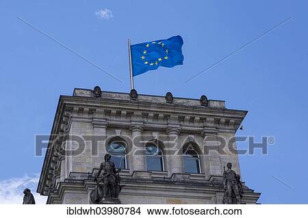 Picture - "European flag over the Reichstag parliament, Berlin, Germany, Europe". Fotosearch