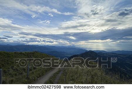 Stock Photo - "Evening clouds seen from Mt. Hochgrat, Oberstaufen, Bavaria, Germany, Europe". Fotosearch
