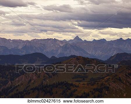 "Evening clouds seen from Mt. Hochgrat with view to the south, Oberstaufen, Bavaria, Germany, Europe" View Large Photo Image Stock Photography - "Evening clouds seen from Mt. Hochgrat with view to the south, Oberstaufen, Bavaria, Germany, Europe". Fotosearch