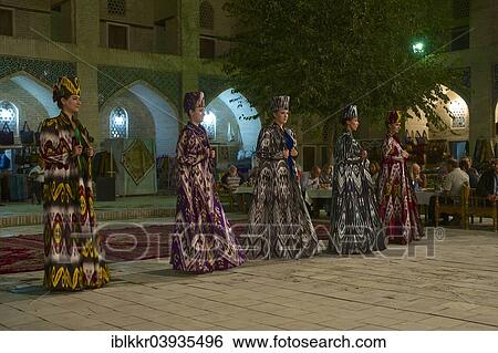 "Evening event with local food and dancing, Nadir Divan-Beghi madrasah, Bukhara, Uzbekistan, Asia" View Large Photo Image Stock Photograph - "Evening event with local food and dancing, Nadir Divan-Beghi madrasah, Bukhara, Uzbekistan, Asia". Fotosearch