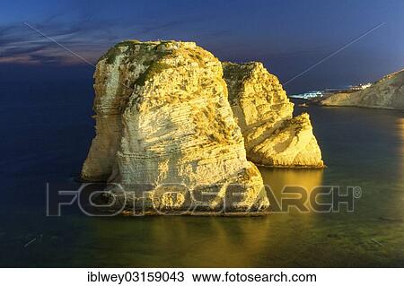 "Evening mood at El Rawsheh Rock or Pigeon Rocks, Beirut, Lebanon, Asia" View Large Photo Image Stock Image - "Evening mood at El Rawsheh Rock or Pigeon Rocks, Beirut, Lebanon, Asia". Fotosearch