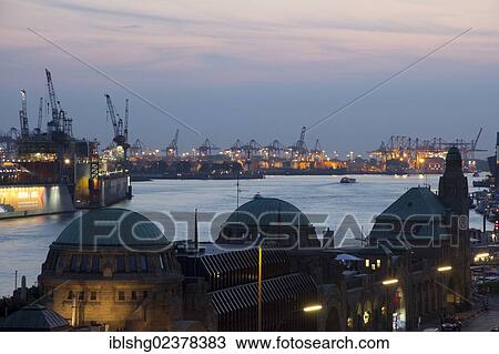 Stock Image - "Evening mood at the St. Pauli Landing Bridges, harbour, Hamburg, Germany, Europe". Fotosearch