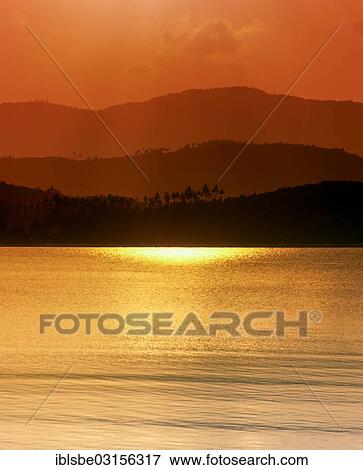 "Evening mood by the sea, hills with palm trees at sunset, Ko Samui, Southern Thailand, Thailand, Asia" View Large Photo Image Stock Photo - "Evening mood by the sea, hills with palm trees at sunset, Ko Samui, Southern Thailand, Thailand, Asia". Fotosearch