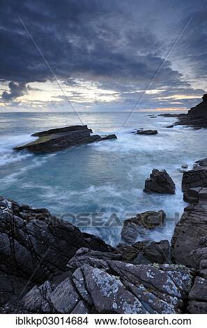"Evening on the coast of the Atlantic Ocean with rocks on the shore, Northern Highlands, Highlands, Sutherland County, Highland, Scotland, United Kingdom, Europe" View Large Photo Image Picture - "Evening on the coast of the Atlantic Ocean with rocks on the shore, Northern Highlands, Highlands, Sutherland County, Highland, Scotland, United Kingdom, Europe". Fotosearch