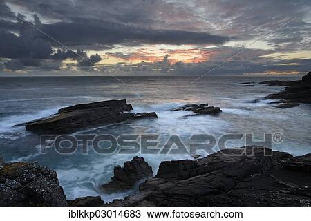 "Evening on the coast of the Atlantic Ocean with steep rocks on the shore, Northern Highlands, Highlands, Sutherland County, Highland, Scotland, United Kingdom, Europe" View Large Photo Image Stock Image - "Evening on the coast of the Atlantic Ocean with steep rocks on the shore, Northern Highlands, Highlands, Sutherland County, Highland, Scotland, United Kingdom, Europe". Fotosearch