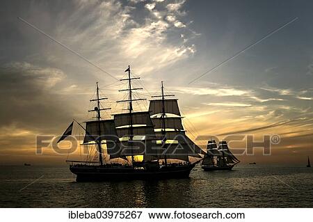 "Evening sail with the tall ship Stad Amsterdam at the front, Hanse Sail 2014, Warnemunde, Mecklenburg-Western Pomerania, Germany, Europe" View Large Photo Image Stock Photo - "Evening sail with the tall ship Stad Amsterdam at the front, Hanse Sail 2014, Warnemunde, Mecklenburg-Western Pomerania, Germany, Europe". Fotosearch