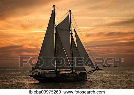 "Evening sail with the two-masted schooner SS """"OBAN"""", Hanse Sail 2014 Warnemunde, Mecklenburg-Western Pomerania, Germany, Europe" View Large Photo Image Stock Photo - "Evening sail with the two-masted schooner SS """"OBAN"""", Hanse Sail 2014 Warnemunde, Mecklenburg-Western Pomerania, Germany, Europe". Fotosearch