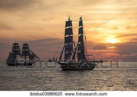 "Evening sailing with the Mercedes in the foreground, Hanse Sail 2014 Warnemunde, Mecklenburg-Western Pomerania, Germany, Europe" View Large Photo Image Stock Image - "Evening sailing with the Mercedes in the foreground, Hanse Sail 2014 Warnemunde, Mecklenburg-Western Pomerania, Germany, Europe". Fotosearch
