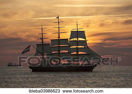 "Evening sailing with the Stad Amsterdam in the foreground, at the Hanse Sail 2014 Warnemunde, Mecklenburg-Western Pomerania, Germany, Europe" View Large Photo Image Stock Image - "Evening sailing with the Stad Amsterdam in the foreground, at the Hanse Sail 2014 Warnemunde, Mecklenburg-Western Pomerania, Germany, Europe". Fotosearch