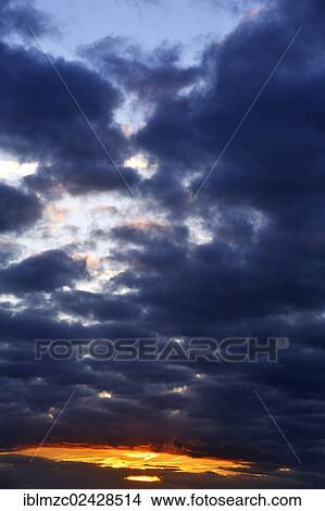 Picture - "Evening sky after a thunderstorm, Othenstorf, Mecklenburg-Western Pomerania, Germany, Europe". Fotosearch