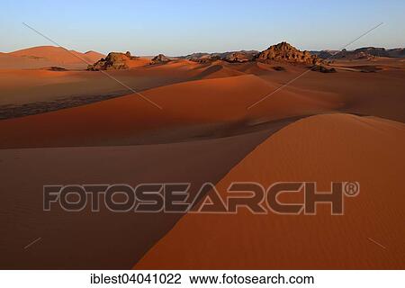 "Evening twilight over the sand dunes of Tin Merzouga, Tassili n'Ajjer National Park, Unesco World Heritage Site, Tadrart region, Sahara desert, Algeria, Africa" View Large Photo Image Stock Image - "Evening twilight over the sand dunes of Tin Merzouga, Tassili n'Ajjer National Park, Unesco World Heritage Site, Tadrart region, Sahara desert, Algeria, Africa". Fotosearch