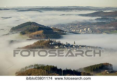 "Eversberg in the fog, Meschede, Sauerland region, North Rhine-Westphalia, Germany, Europe" View Large Photo Image Picture - "Eversberg in the fog, Meschede, Sauerland region, North Rhine-Westphalia, Germany, Europe". Fotosearch
