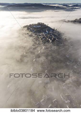 "Eversberg in the fog, Meschede, Sauerland region, North Rhine-Westphalia, Germany, Europe" View Large Photo Image Picture - "Eversberg in the fog, Meschede, Sauerland region, North Rhine-Westphalia, Germany, Europe". Fotosearch