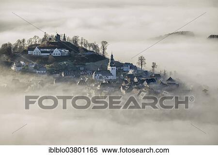"Eversberg in the fog, Meschede, Sauerland region, North Rhine-Westphalia, Germany, Europe" View Large Photo Image Stock Photography - "Eversberg in the fog, Meschede, Sauerland region, North Rhine-Westphalia, Germany, Europe". Fotosearch