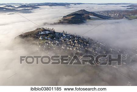 "Eversberg in the fog, Meschede, Sauerland region, North Rhine-Westphalia, Germany, Europe" View Large Photo Image Stock Photography - "Eversberg in the fog, Meschede, Sauerland region, North Rhine-Westphalia, Germany, Europe". Fotosearch