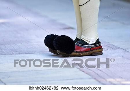 "Evzone, Presidential Guard, detail, feet, during the changing of the guard behind the Parliament on Syntagma Square, Athens, Greece, Europe" View Large Photo Image Stock Image - "Evzone, Presidential Guard, detail, feet, during the changing of the guard behind the Parliament on Syntagma Square, Athens, Greece, Europe". Fotosearch