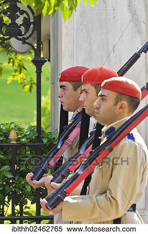 "Evzones, Presidential Guards, during the changing of the guard behind the Parliament on Syntagma Square, Athens, Greece, Europe" View Large Photo Image Stock Photography - "Evzones, Presidential Guards, during the changing of the guard behind the Parliament on Syntagma Square, Athens, Greece, Europe". Fotosearch