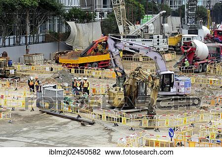 "Excavator at a construction site in Chung Wan, Central District, Hong Kong Island, Hong Kong, China, Asia" View Large Photo Image Stock Image - "Excavator at a construction site in Chung Wan, Central District, Hong Kong Island, Hong Kong, China, Asia". Fotosearch