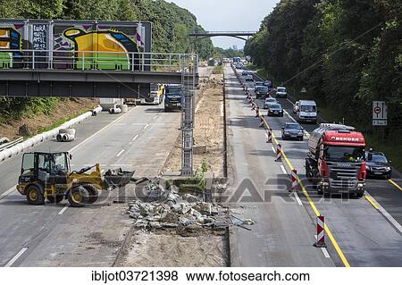 "Excavator, motorway construction site on the A52 motorway, Ratingen, North Rhine-Westphalia, Germany, Europe" View Large Photo Image Stock Photo - "Excavator, motorway construction site on the A52 motorway, Ratingen, North Rhine-Westphalia, Germany, Europe". Fotosearch