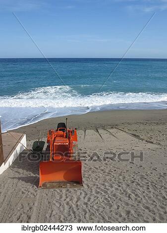 "Excavator on a beach on the Italian Riviera, Italy, Europe" View Large Photo Image Stock Image - "Excavator on a beach on the Italian Riviera, Italy, Europe". Fotosearch