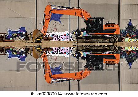 Picture - "Excavator, reflection, large construction site, Hamburg, Germany, Europe, PublicGround, Europe". Fotosearch