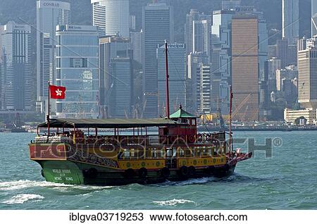 "Excursion boat crosses in front of the skyscrapers of Hong Kong Central District, Central District, Hong Kong, Hong Kong Island, Hong kong, China, People's Republic of China, Asia" View Large Photo Image Stock Image - "Excursion boat crosses in front of the skyscrapers of Hong Kong Central District, Central District, Hong Kong, Hong Kong Island, Hong kong, China, People's Republic of China, Asia". Fotosearch