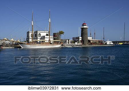 "Excursion boat for tourists, former lighthouse, Marina Rubicon, Playa Blanca, Lanzarote, Canary Islands, Spain, Europe" View Large Photo Image Stock Image - "Excursion boat for tourists, former lighthouse, Marina Rubicon, Playa Blanca, Lanzarote, Canary Islands, Spain, Europe". Fotosearch