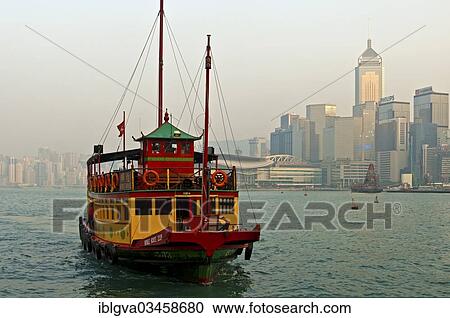 Stock Image - "Excursion boat in front of the Wan Chai district, Hong Kong, Hong Kong, China, People's Republic of China, Asia". Fotosearch