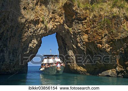 "Excursion boat, natural arch, Arco Magno, San Nicola Arcella, Capo Scalea, Calabria, Italy, Europe" View Large Photo Image Picture - "Excursion boat, natural arch, Arco Magno, San Nicola Arcella, Capo Scalea, Calabria, Italy, Europe". Fotosearch