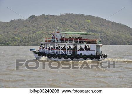 Stock Photo - "Excursion boat off Elephanta Island, Mumbai, Maharashtra, India, Asia". Fotosearch