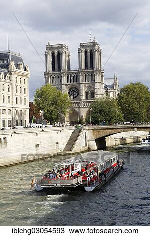 "Excursion boat on Seine river, Notre-Dame de Paris cathedral at back, Paris, Seine, France, Europe" View Large Photo Image Stock Image - "Excursion boat on Seine river, Notre-Dame de Paris cathedral at back, Paris, Seine, France, Europe". Fotosearch