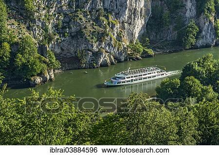 Stock Photograph - "Excursion boat on the Danube River in the Danube Gorge, Kelheim, Lower Bavaria, Bavaria, Germany, Europe". Fotosearch