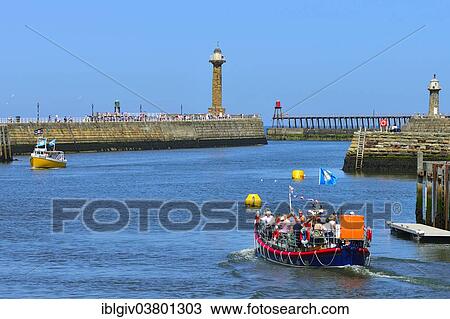 Stock Image - "Excursion boat on the River Esk, Whitby, North Yorkshire, England, United Kingdom, Europe". Fotosearch