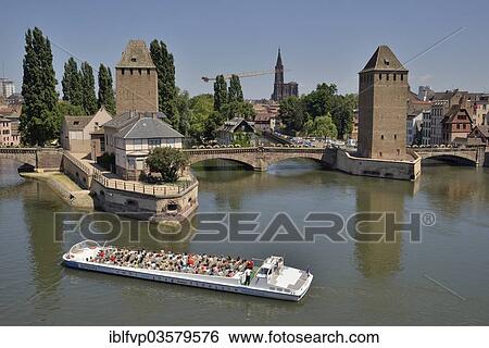 "Excursion boat on the River Ill at the Ponts Couverts bridge with towers, UNESCO World Heritage Site, historic centre or Grand Ile, Strasbourg, Departement Bas-Rhin, Alsace, France, Europe" View Large Photo Image Stock Photograph - "Excursion boat on the River Ill at the Ponts Couverts bridge with towers, UNESCO World Heritage Site, historic centre or Grand Ile, Strasbourg, Departement Bas-Rhin, Alsace, France, Europe". Fotosearch