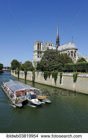 "Excursion boat on the Seine, eastern side of Notre-Dame de Paris or Notre-Dame Cathedral, Seine, Ile de la Cite, 4th Arrondissement, Paris, France, Europe" View Large Photo Image Picture - "Excursion boat on the Seine, eastern side of Notre-Dame de Paris or Notre-Dame Cathedral, Seine, Ile de la Cite, 4th Arrondissement, Paris, France, Europe". Fotosearch