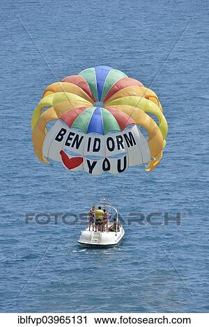 "Excursion boat with paraglider, labeled " Benidorm loves you", Playa Levante, Benidorm, Costa Blanca, Spain, Europe" View Large Photo Image Stock Image - "Excursion boat with paraglider, labeled " Benidorm loves you", Playa Levante, Benidorm, Costa Blanca, Spain, Europe". Fotosearch