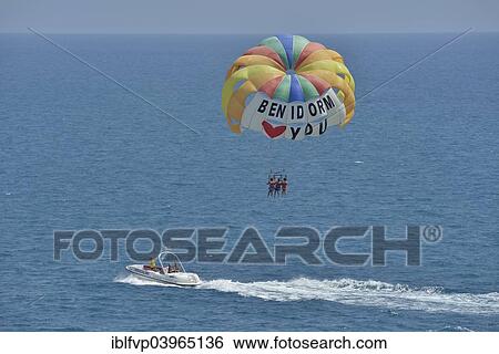 "Excursion boat with paraglider, labeled " Benidorm loves you", Playa Levante, Benidorm, Costa Blanca, Spain, Europe" View Large Photo Image Stock Photograph - "Excursion boat with paraglider, labeled " Benidorm loves you", Playa Levante, Benidorm, Costa Blanca, Spain, Europe". Fotosearch