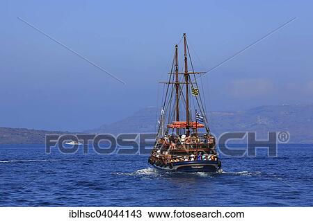 "Excursion boat with tourists, from Thira to the volcanic island of Nea Kameni, Santorini, Cyclades, Aegean Sea, Greece, Europe" View Large Photo Image Stock Image - "Excursion boat with tourists, from Thira to the volcanic island of Nea Kameni, Santorini, Cyclades, Aegean Sea, Greece, Europe". Fotosearch