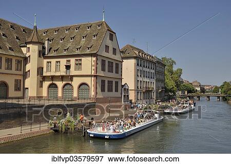 "Excursion boat with tourists in front of the old slaughterhouse, Ancienne Boucherie, on the River Ill, """"La Petite France"""", UNESCO World Heritage Site, Petite-France, Strasbourg, Departement Bas-Rhin, Alsace, France, Europe" View Large Photo Image Stock Photo - "Excursion boat with tourists in front of the old slaughterhouse, Ancienne Boucherie, on the River Ill, """"La Petite France"""", UNESCO World Heritage Site, Petite-France, Strasbourg, Departement Bas-Rhin, Alsace, France, Europe". Fotosearch
