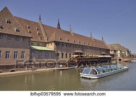 "Excursion boat with tourists in front of the old customs buildings on the River Ill, """"La Petite France"""", UNESCO World Heritage Site, Petite-France, Strasbourg, Departement Bas-Rhin, Alsace, France, Europe" View Large Photo Image Stock Photography - "Excursion boat with tourists in front of the old customs buildings on the River Ill, """"La Petite France"""", UNESCO World Heritage Site, Petite-France, Strasbourg, Departement Bas-Rhin, Alsace, France, Europe". Fotosearch