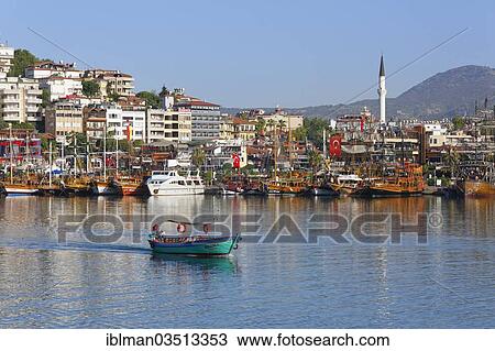 "Excursion boats and a fishing boat in the harbour, Alanya, Turkish Riviera, Province of Antalya, Mediterranean Region, Turkey, Asia" View Large Photo Image Stock Image - "Excursion boats and a fishing boat in the harbour, Alanya, Turkish Riviera, Province of Antalya, Mediterranean Region, Turkey, Asia". Fotosearch