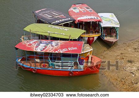 "Excursion boats for tourists, near Rangamati Suspension Bridge, Rangamati, Kaptai Lake, Chittagong Hill Tracts, Bangladesh, South Asia, Asia" View Large Photo Image Stock Image - "Excursion boats for tourists, near Rangamati Suspension Bridge, Rangamati, Kaptai Lake, Chittagong Hill Tracts, Bangladesh, South Asia, Asia". Fotosearch