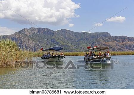 "Excursion boats in the Dalyan Delta, Dalyan, Mugla Province, Turkish Riviera or Turquoise Coast, Aegean, Turkey, Asia" View Large Photo Image Stock Image - "Excursion boats in the Dalyan Delta, Dalyan, Mugla Province, Turkish Riviera or Turquoise Coast, Aegean, Turkey, Asia". Fotosearch