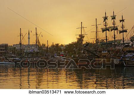 "Excursion boats in the harbour in the evening light, Alanya, Turkish Riviera, Province of Antalya, Mediterranean Region, Turkey, Asia" View Large Photo Image Stock Image - "Excursion boats in the harbour in the evening light, Alanya, Turkish Riviera, Province of Antalya, Mediterranean Region, Turkey, Asia". Fotosearch