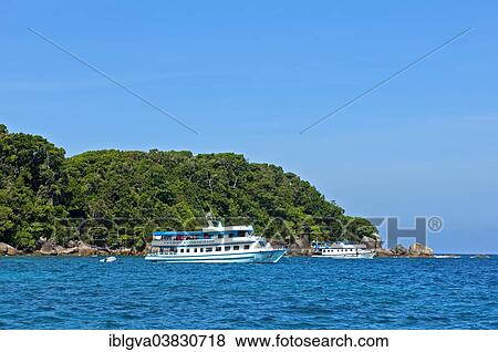 "Excursion boats moored off the Similan Islands, Mu Ko Similan National Park, Thailand, Asia" View Large Photo Image Stock Photo - "Excursion boats moored off the Similan Islands, Mu Ko Similan National Park, Thailand, Asia". Fotosearch