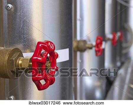 "Exhaust air plant, heating, valves with red hand wheels, Baden-Wurttemberg, Germany, Europe" View Large Photo Image Stock Photograph - "Exhaust air plant, heating, valves with red hand wheels, Baden-Wurttemberg, Germany, Europe". Fotosearch