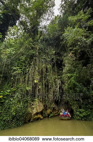 "Exit of the cave system, tourists in an electric boat, caves of the Indios, Cueva del Indio, underground caves with a river, Vinales, Cuba, North America" View Large Photo Image Stock Photo - "Exit of the cave system, tourists in an electric boat, caves of the Indios, Cueva del Indio, underground caves with a river, Vinales, Cuba, North America". Fotosearch