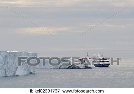 "Expedition cruise ship, Silver Explorer from Silversea Expeditions passing along the front of the Brasvellbreen Glacier, Austlandet, Spitsbergen, Svalbard, Norway, Europe" View Large Photo Image Stock Photo - "Expedition cruise ship, Silver Explorer from Silversea Expeditions passing along the front of the Brasvellbreen Glacier, Austlandet, Spitsbergen, Svalbard, Norway, Europe". Fotosearch